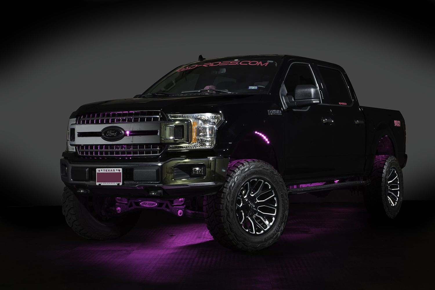 Lifted Custom Ford F-150 4x4 Truck with Custom Led Lighting in Black with  Pink Accents