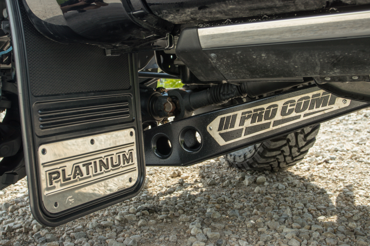 pro comp 8 inch lift on ford f-450 super duty platinum with custom mud flaps