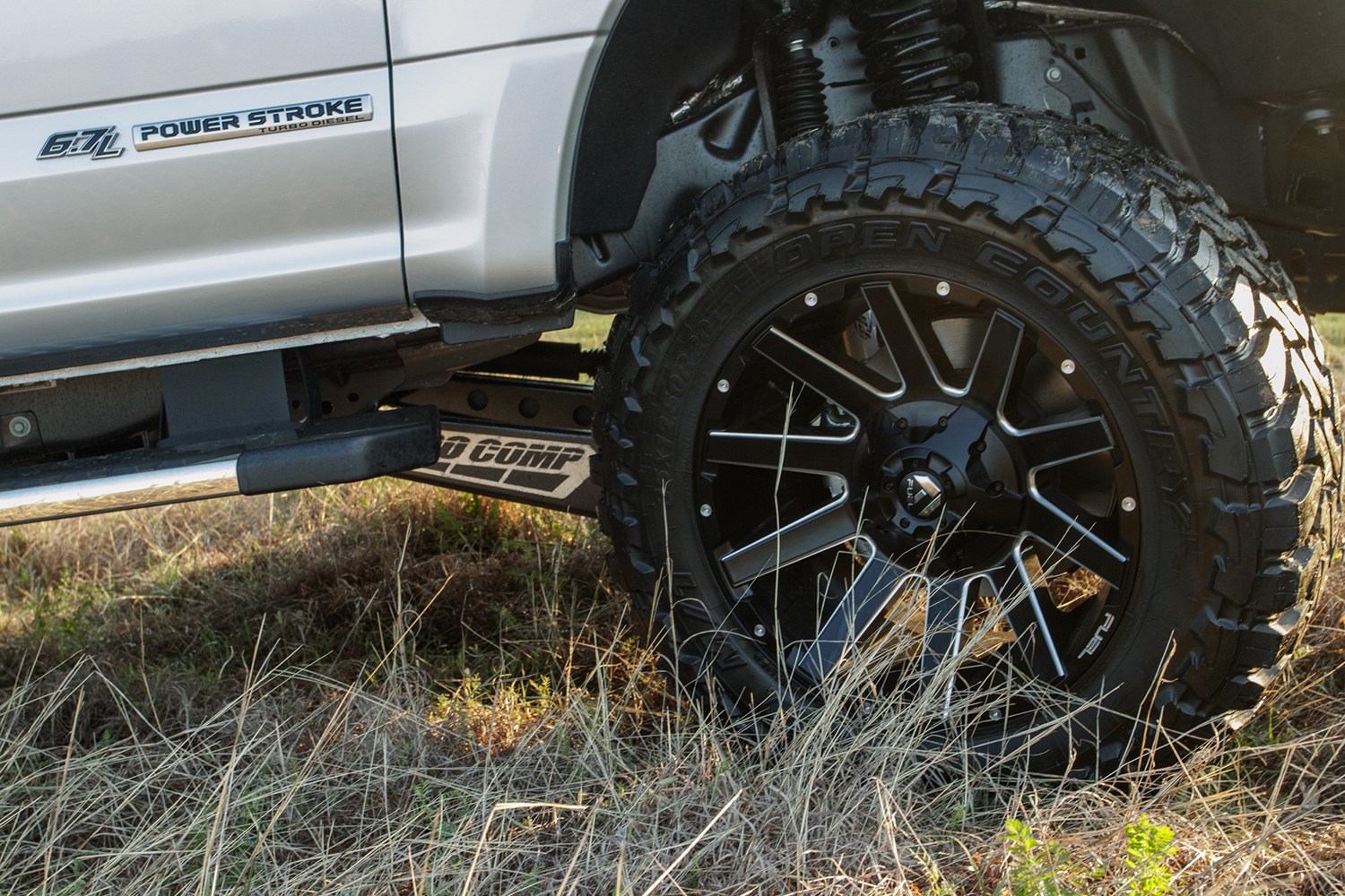 fuel contra 20 inch wheels on a 2018 ford f-250 super duty in silver with pro comp 6 inch lift kit installation at RAD-Rides in garland texas
