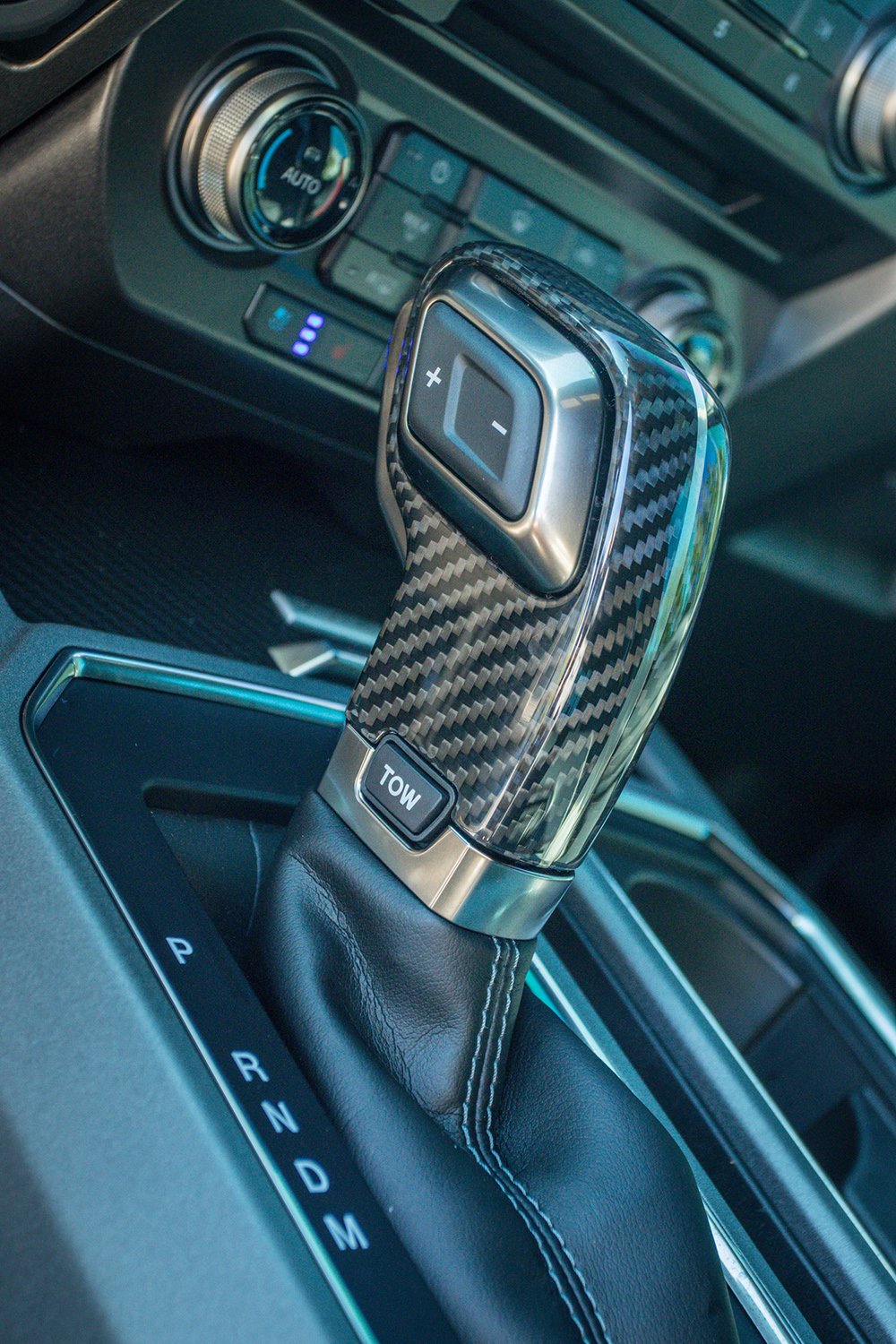 carbon fiber shift selector in 2018 ford f150 raptor 4x4 built by RAD-Rides garland texas
