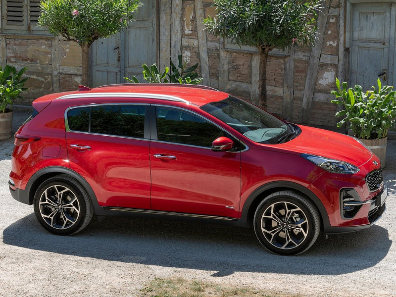 Exterior of a red 2019 Kia Sportage parked in a driveway