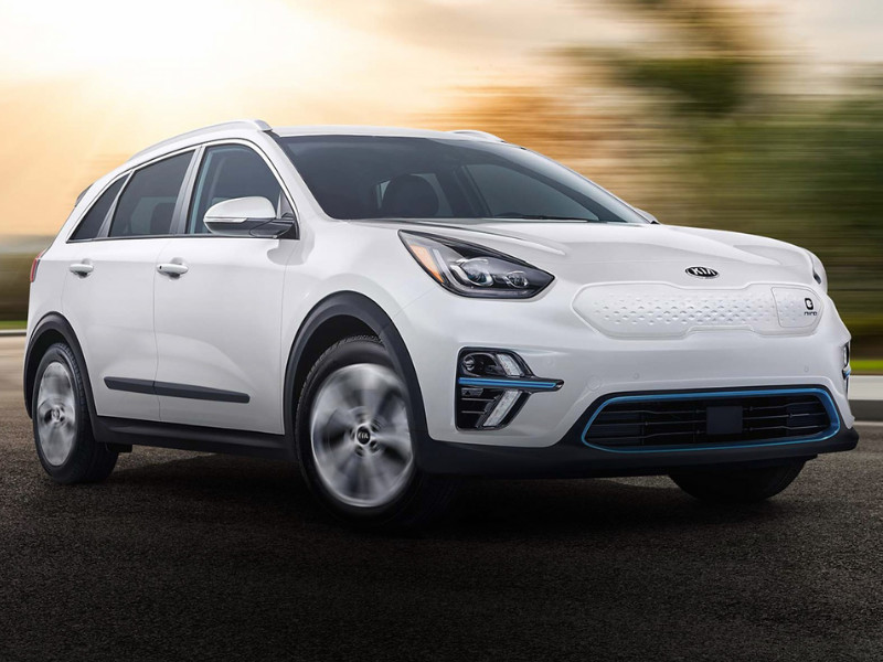 2020 Kia Niro EV driving in-motion exterior white color blue EV trim lines