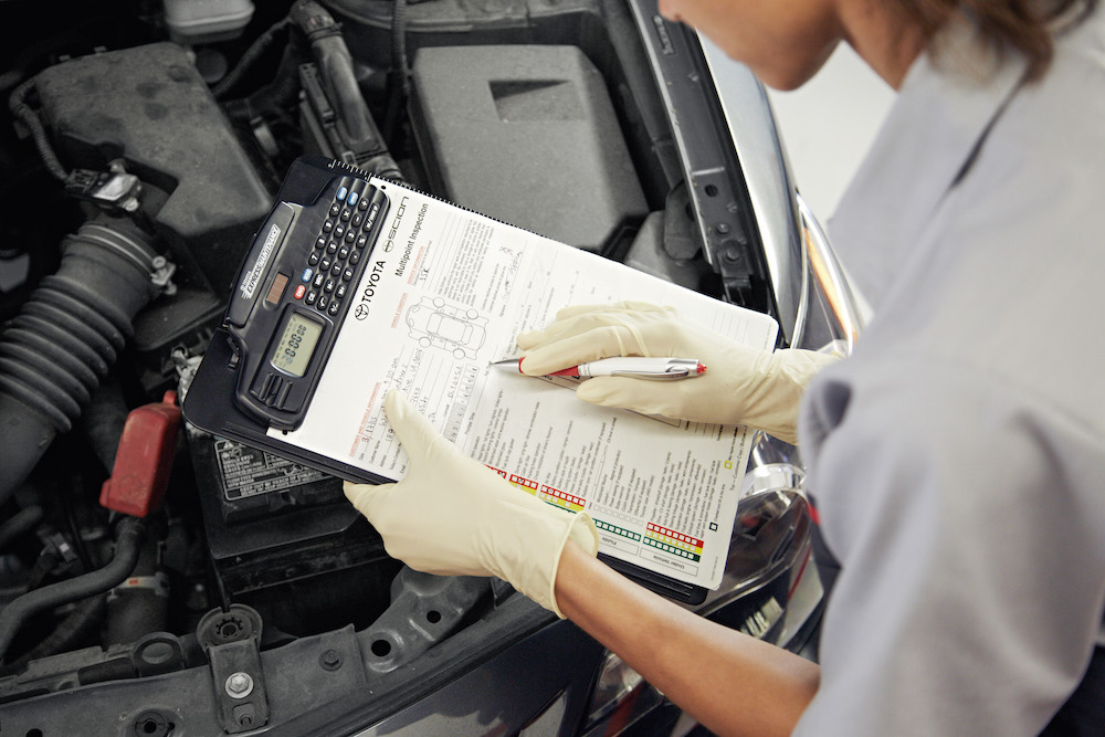 ToyotaCare in Erie at Superior Toyota | Toyota technicians doing multipoint inspection