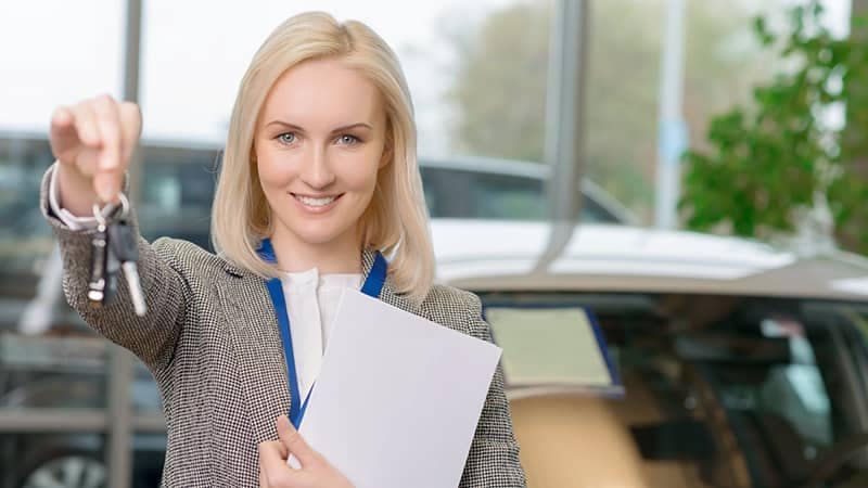 woman-sales-person-holding-keys-depositphotos woman-sales-person-holding-keys-depositphotos