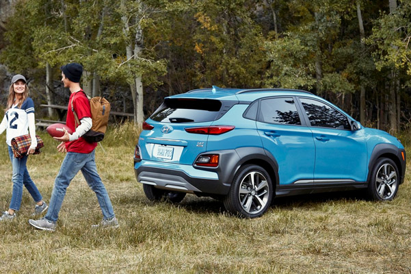 Couple walking away from Hyundai