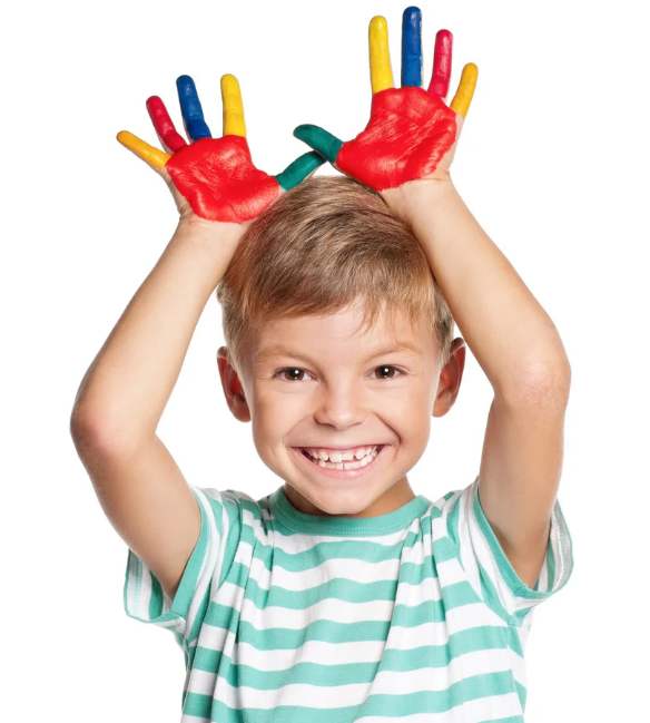 A young child with his hands over his head. His hands are covered with multiple colors of finger paint.