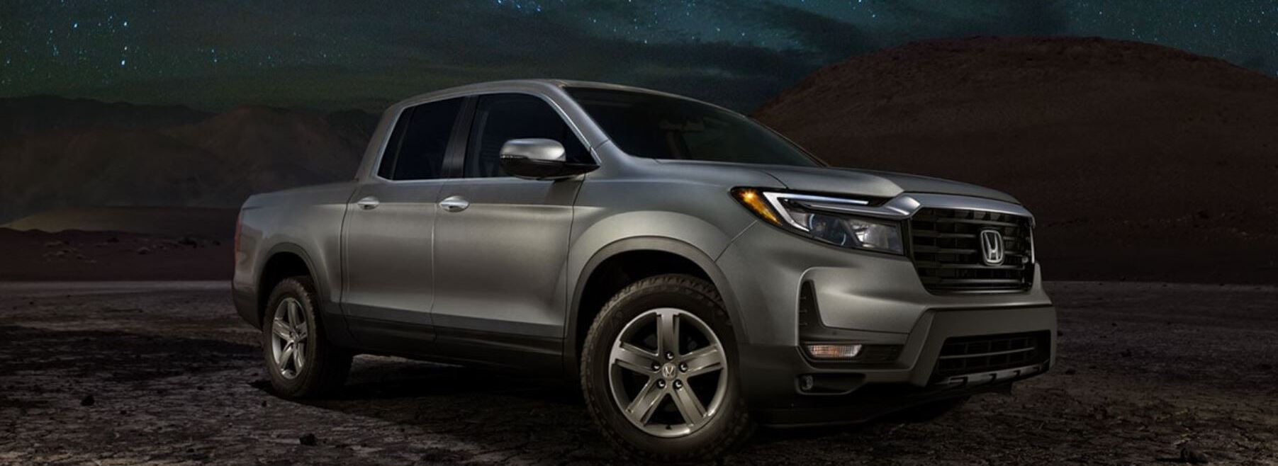 2021 Honda Ridgeline vs 2021 Toyota Tacoma near Katy, TX