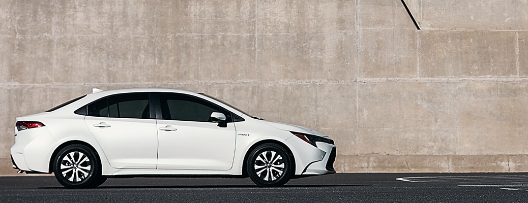 2021 Toyota Corolla Hybrid in front of a concrete wall