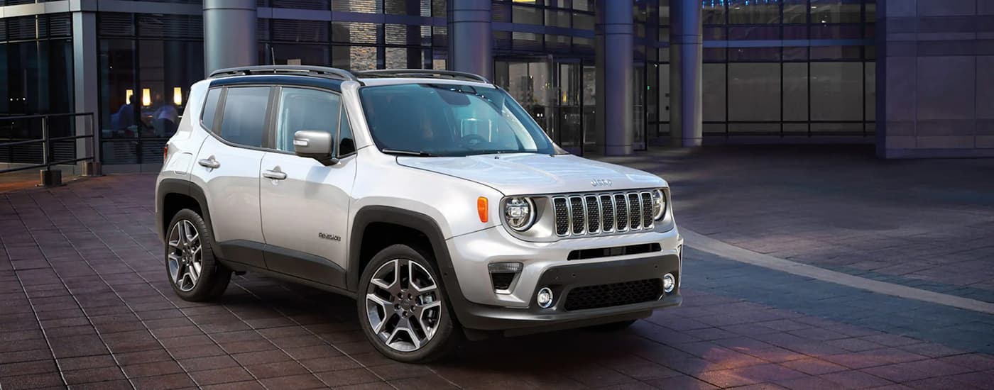 A silver 2022 Jeep Renegade is shown parked by a CDJR dealer near you.