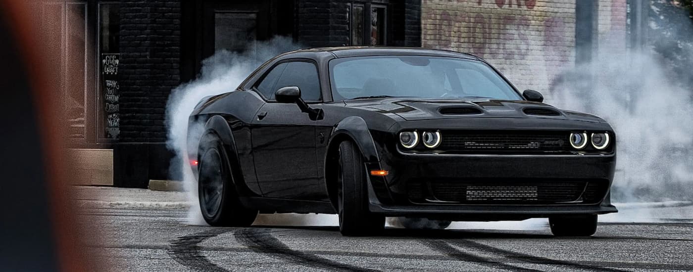 A black 2022 Dodge Challenger SRT Hellcat Redeye is shown after leaving a Dodge dealer in Edmonton.