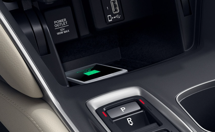 El cargador de teléfono inalámbrico es una característica estandar en el Accord Hybrid Sport, EX–L y Touring.