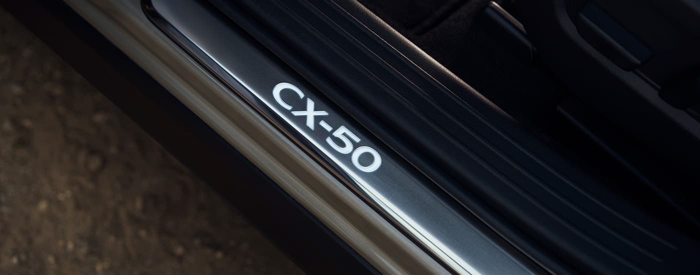 Close up of the CX-50 light-up icon inside the vehicle