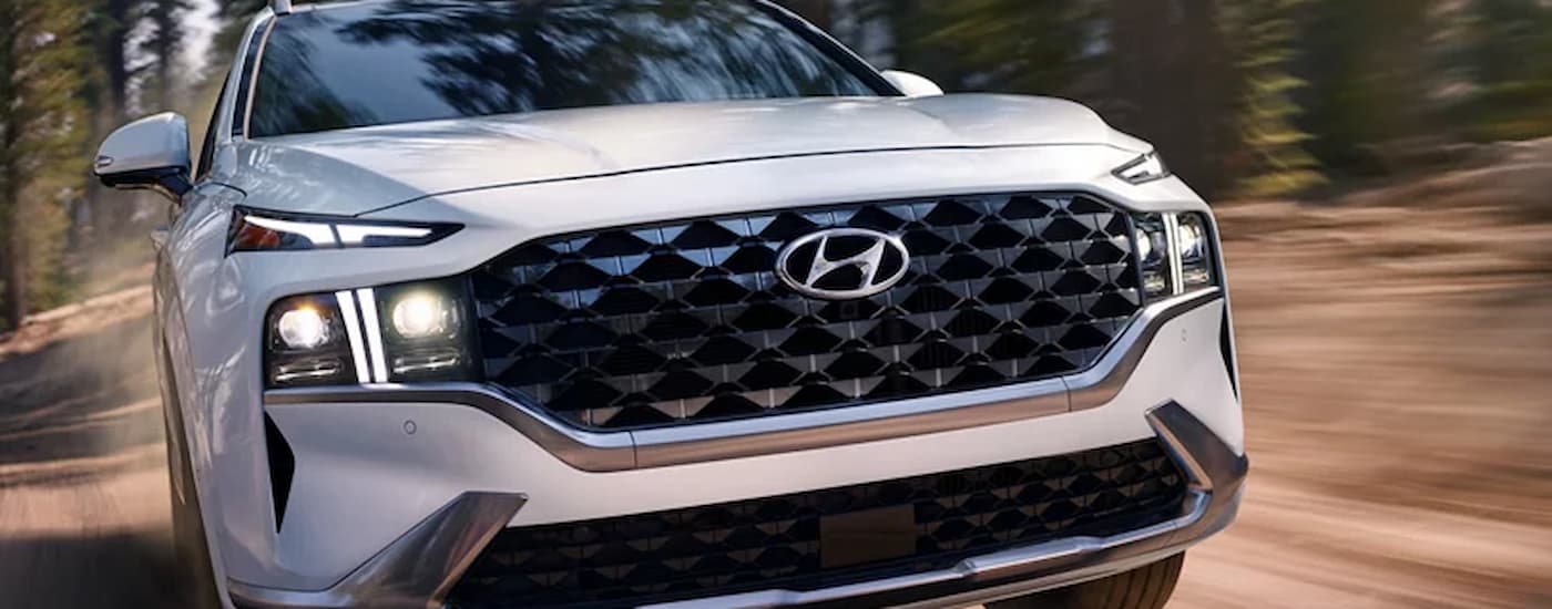 A close up of the front of a 2022 Hyundai Sante Fe is shown.