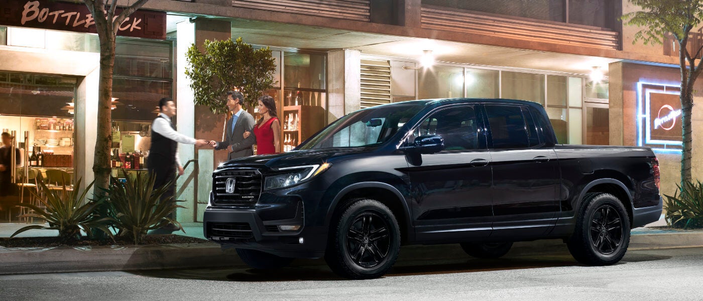 2022 Honda Ridgeline parked outside a restaurant