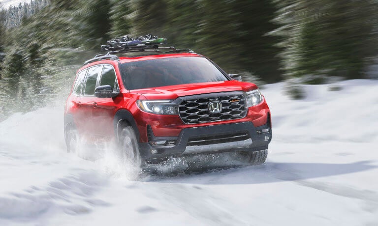 2022 Honda Passport driving in the snow