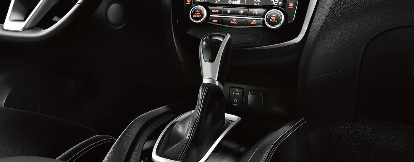 A close up of the shifter in a 2022 used Nissan Qashqai for sale is shown.
