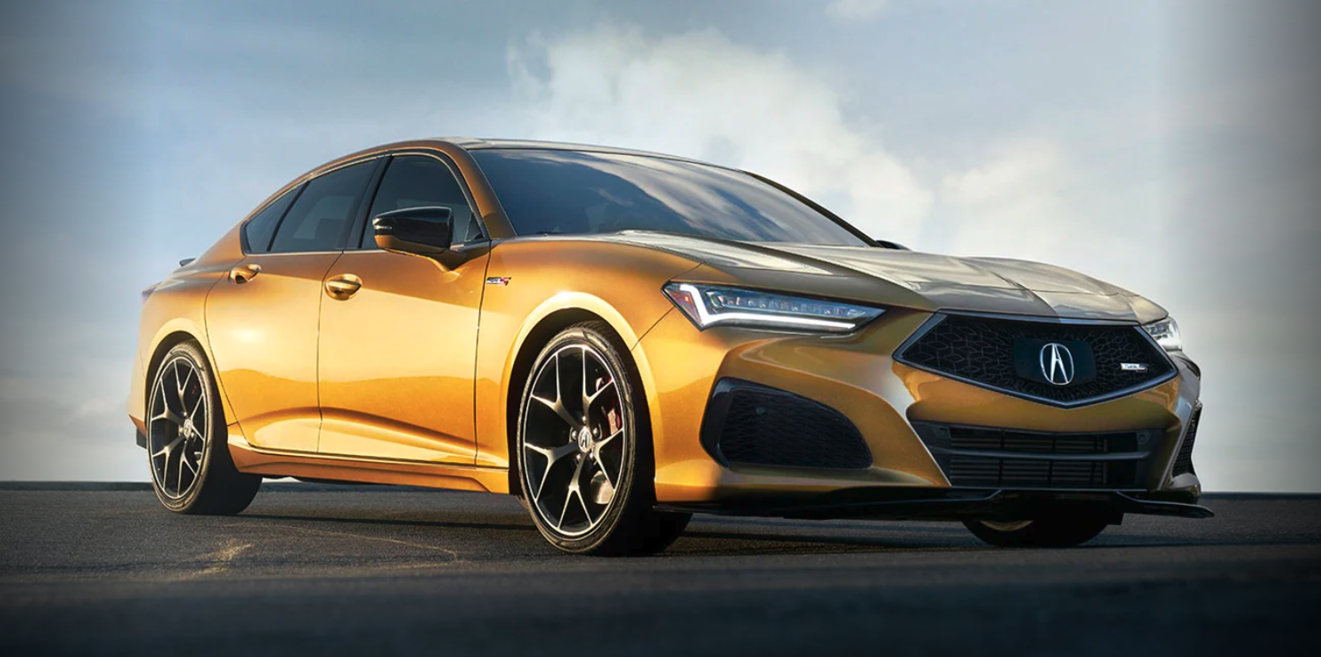 2023vacuravtlxvextierior yellow/gold parked front 3/4 view