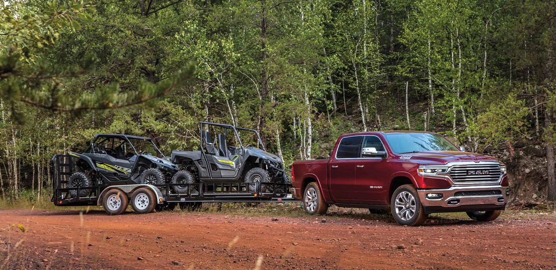 2023 Ram 1500 towing two atvs 