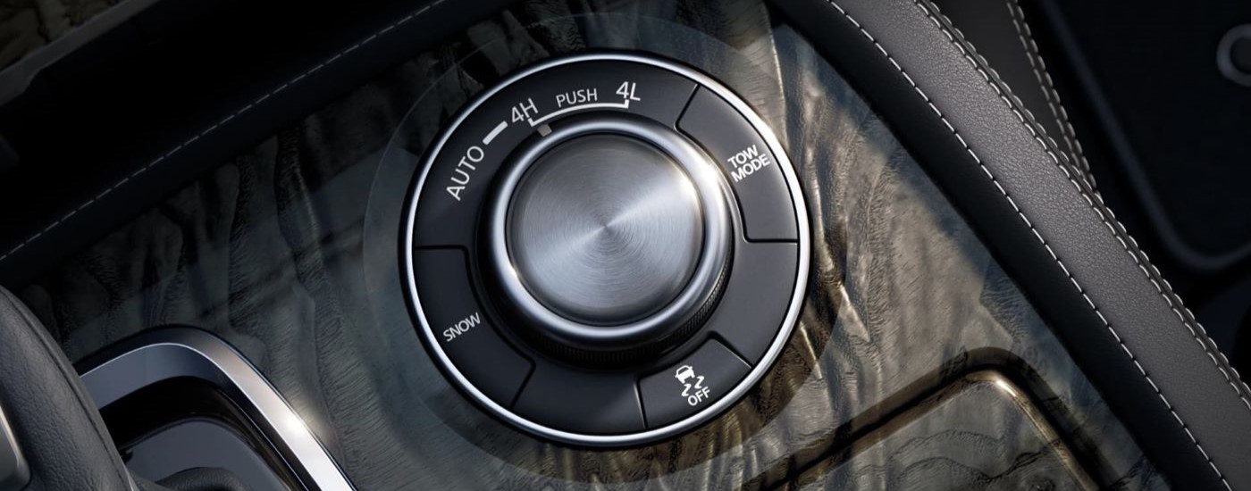 A drive mode knob is shown in a 2022 Nissan Armada.