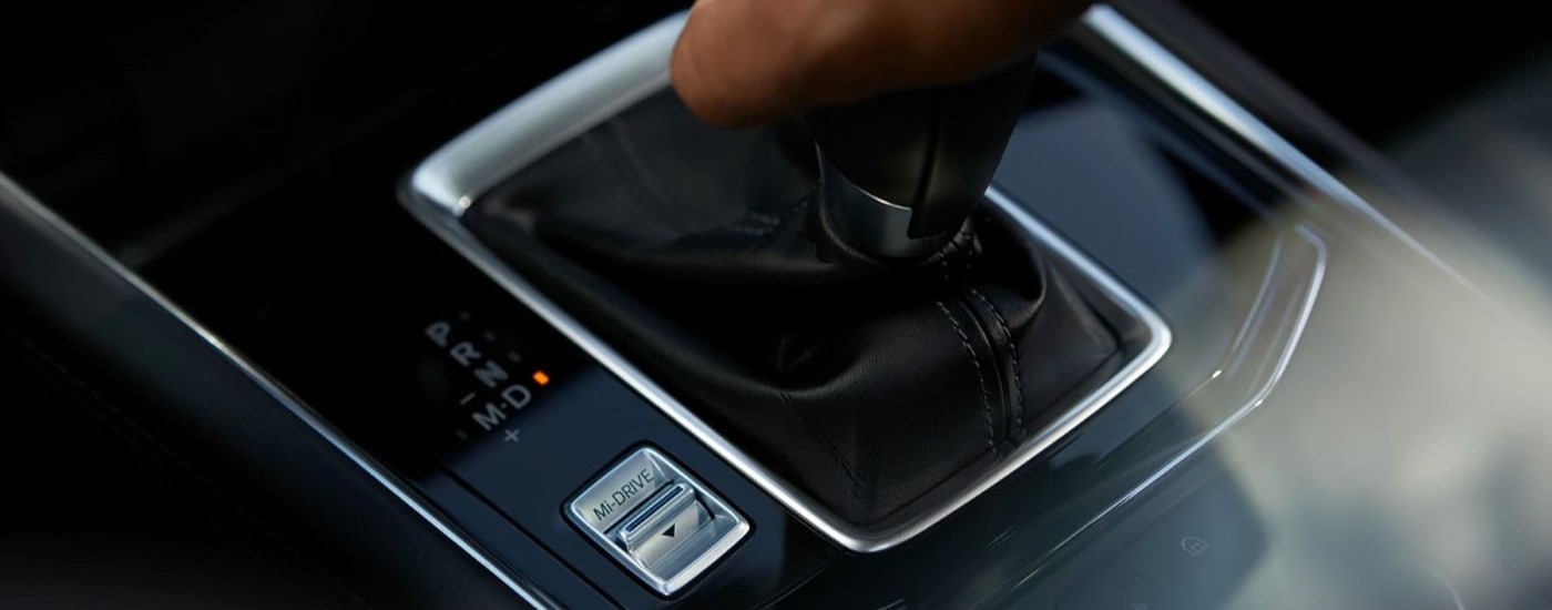 A close up shows the Mi-Drive switch in a 2023 Mazda CX-5.