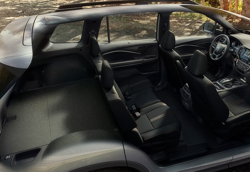 En un Passport 2023 no necesitas abatir los asientos para tener espacio de carga.