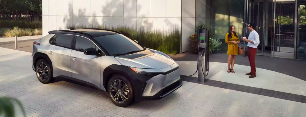 2023 Toyota bZ4X parked near a house entrance