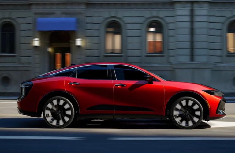 Side view of a red 2023 Toyota Crown.