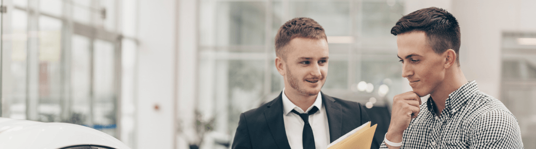 Two men discussing finances