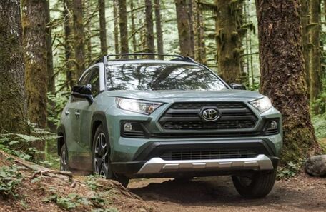 aqua 2021 Toyota RAV4 front fascia driving in forest