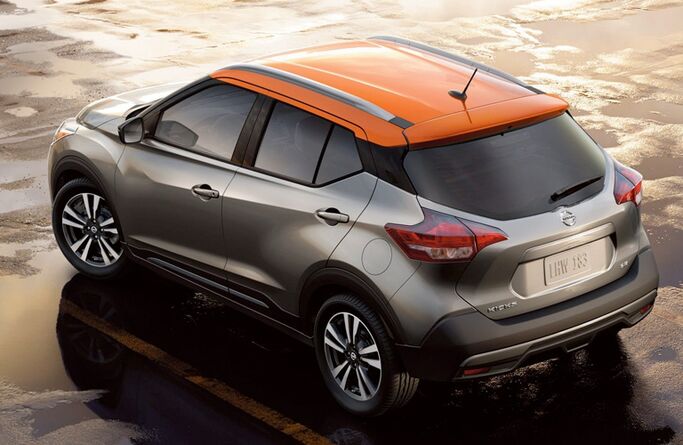 2019 Nissan Kicks red rood silver exterior rear fascia driver side parked
