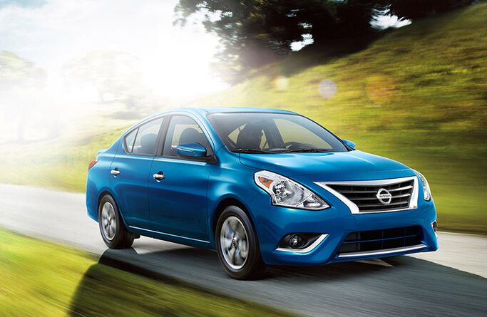 2018 Nissan Versa blue exterior driving