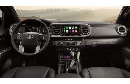2021 Toyota Tacoma interior showing wireless phone charger