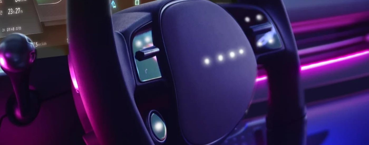 A close up shows the steering wheel in a 2023 Hyundai Ioniq 6.