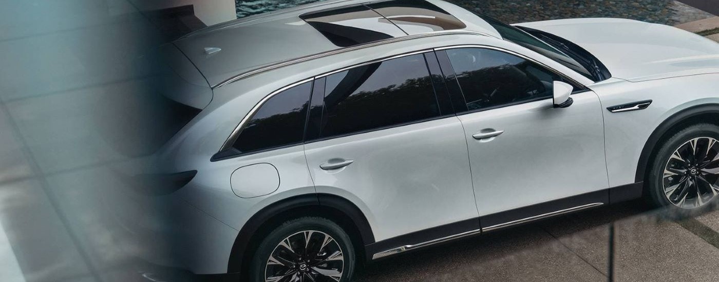 A close up shows a white 2024 Mazda CX-90.