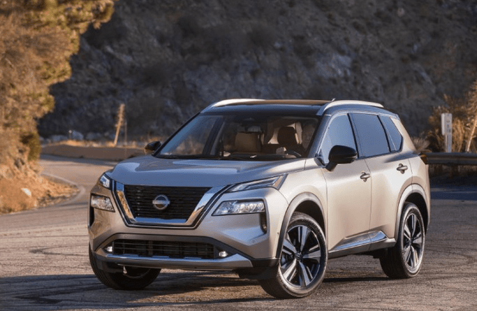 A man driving the 2023 Nissan Rogue