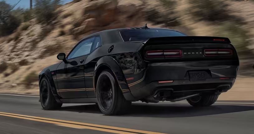 Black reflective vinyl decal on a black Charger Hellcat. Seen here with no  lights shining on the vinyl.