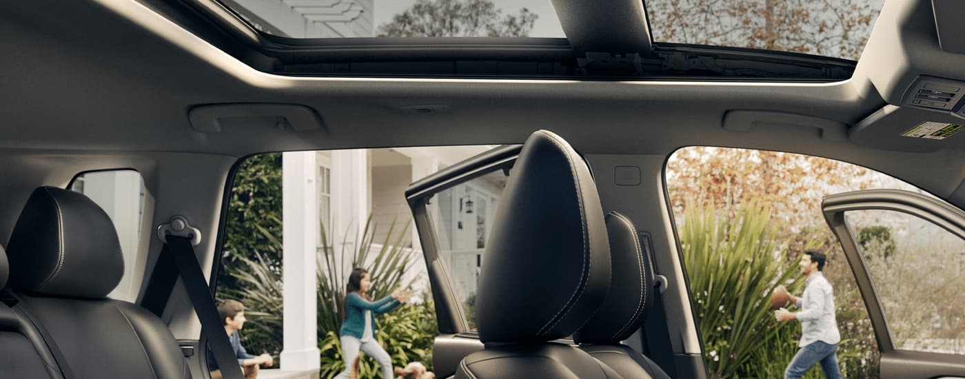 A close up of the interior seating and roof of a 2023 Nissan Rogue is shown.