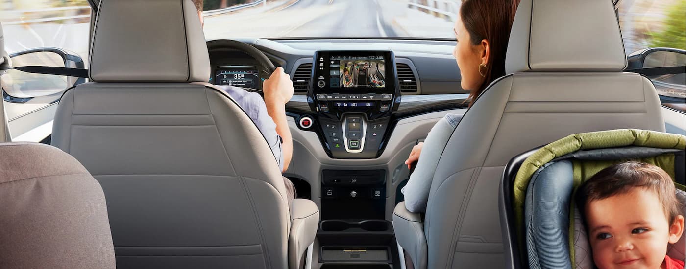 A family is driving in a 2024 Honda Odyssey.