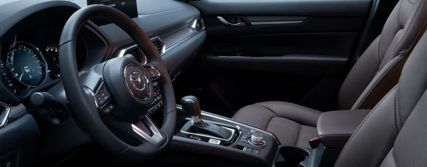 A close up shows the black interior in a 2024 Mazda CX-5.