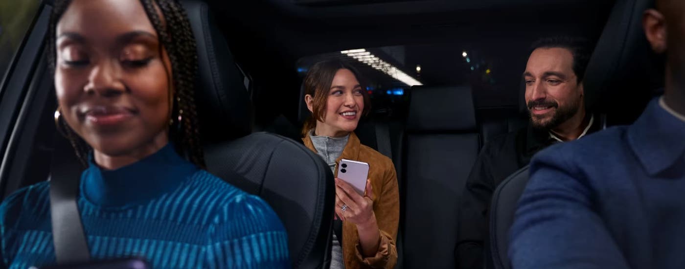 A group of friends are driving in a 2025 Toyota Camry for sale near Wheatland.