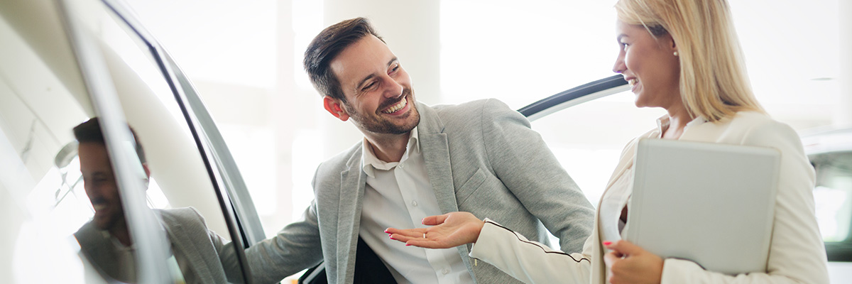 Dealership employees laughing