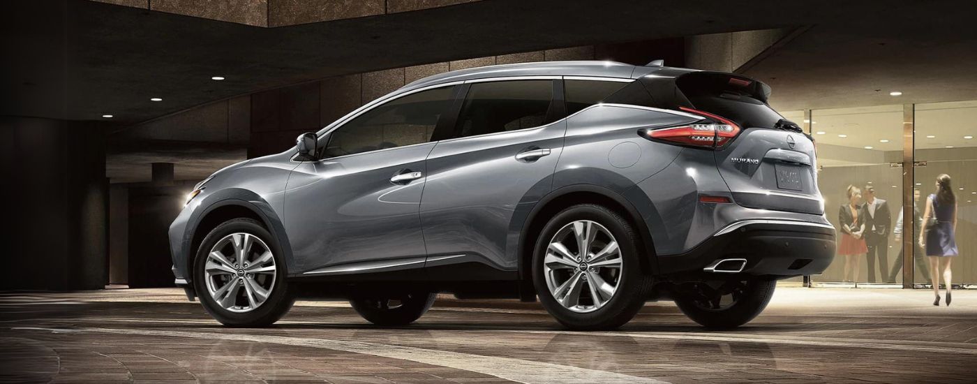 A grey 2024 Nissan Murano is shown from the side after leaving an SUV dealer.