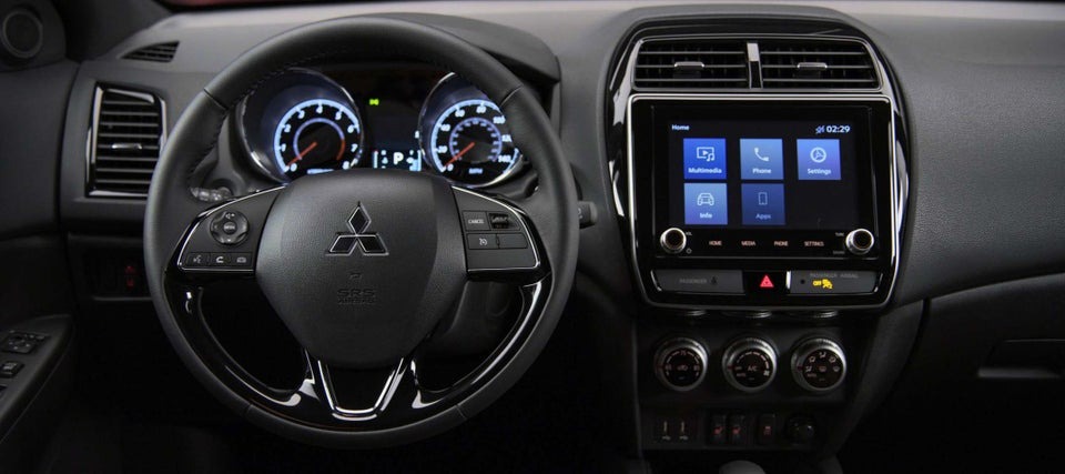2024 Mitsubishi Outlander Sport steering wheel and dashboard