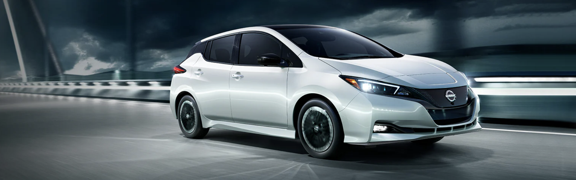 Retired rental Nissan LEAF running across a bridge