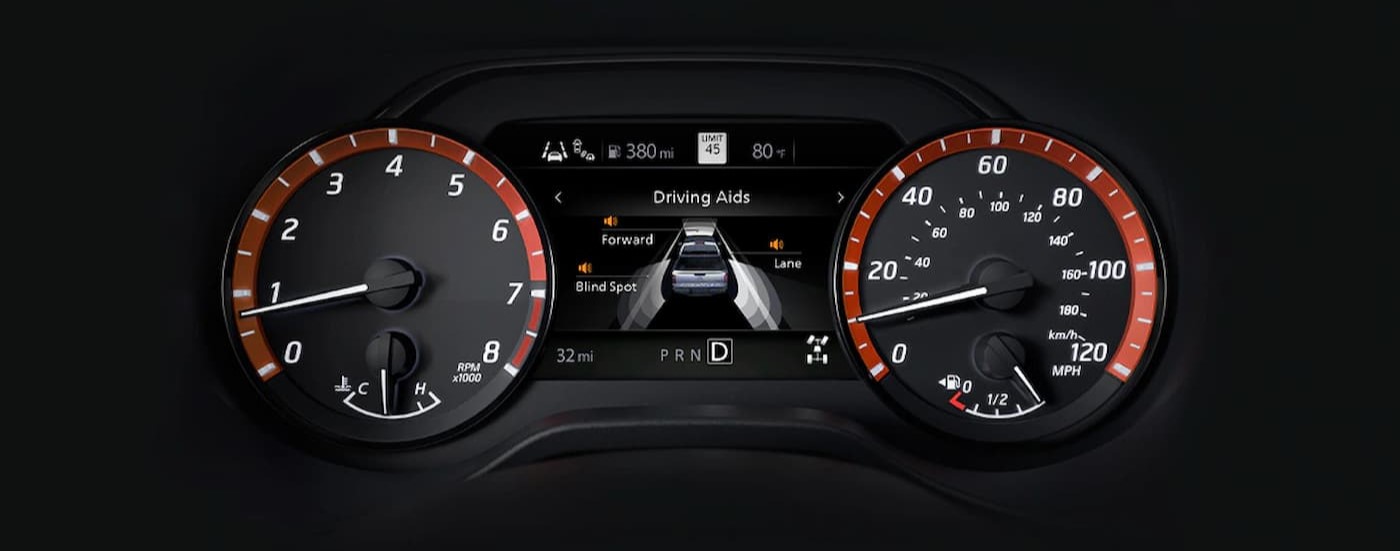 The digital display in a 2024 Nissan Frontier for sale is shown.