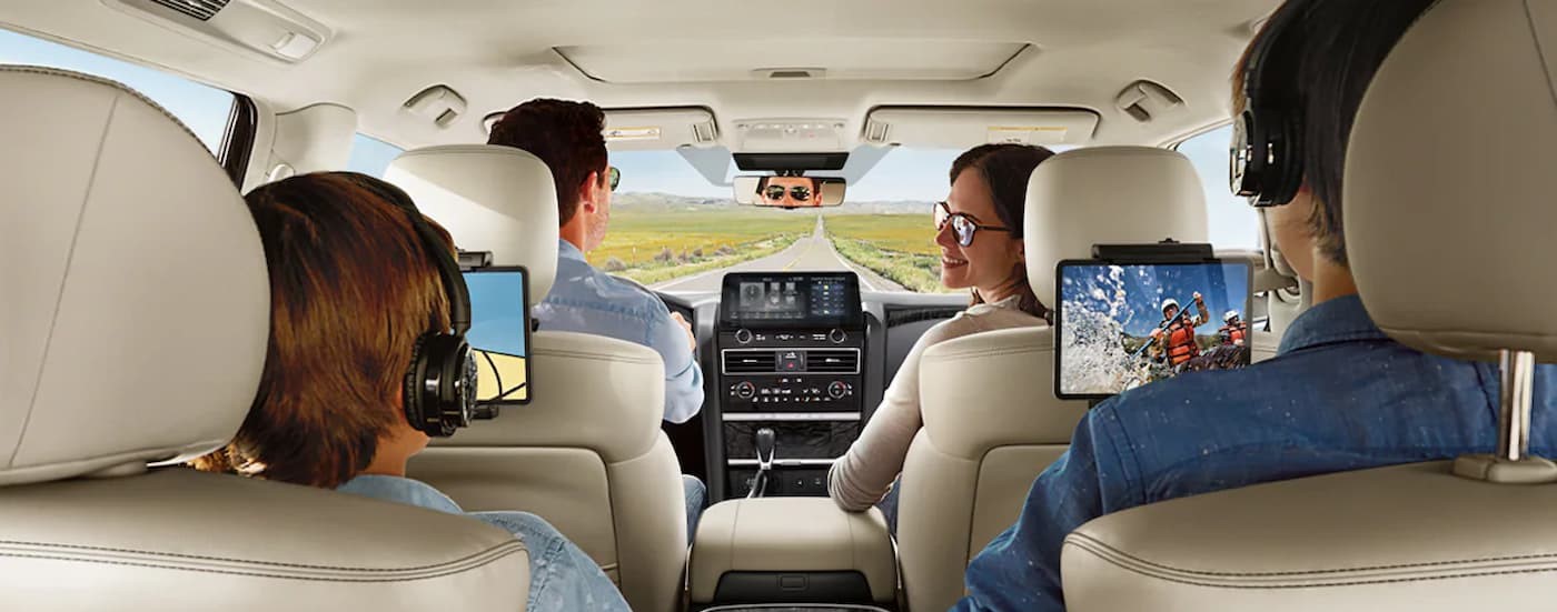 The black and white interior and dash is shown in a 2024 Nissan Armada Platinum.