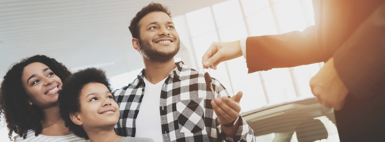 Receive the Keys of a Used Genesis G70!