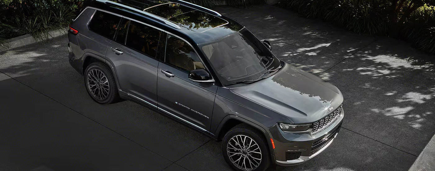Overhead view of a grey 2024 Jeep Grand Cherokee L at a Jeep Dealer.