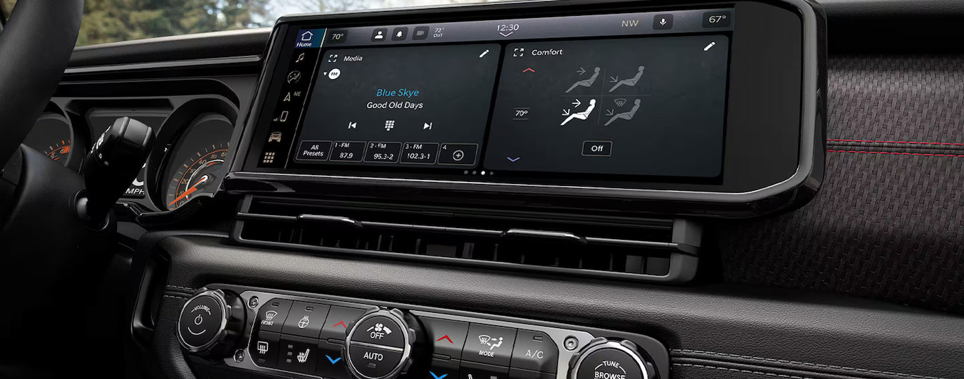 Close-up of the infotainment screen in a 2024 Jeep Gladiator at a Jeep dealer near me.