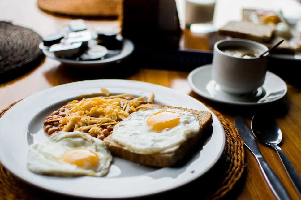 breakfast plate with eggs, toast and more